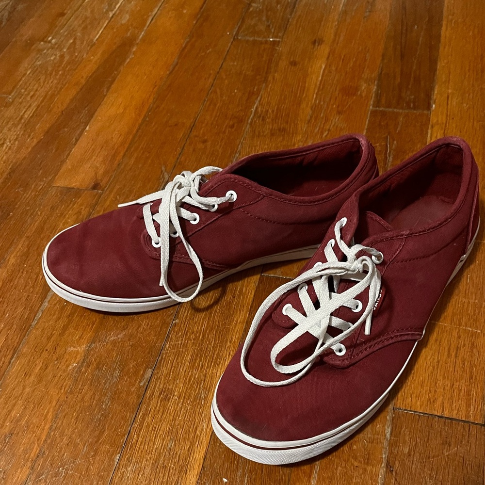 Burgundy and white Vans trainers
